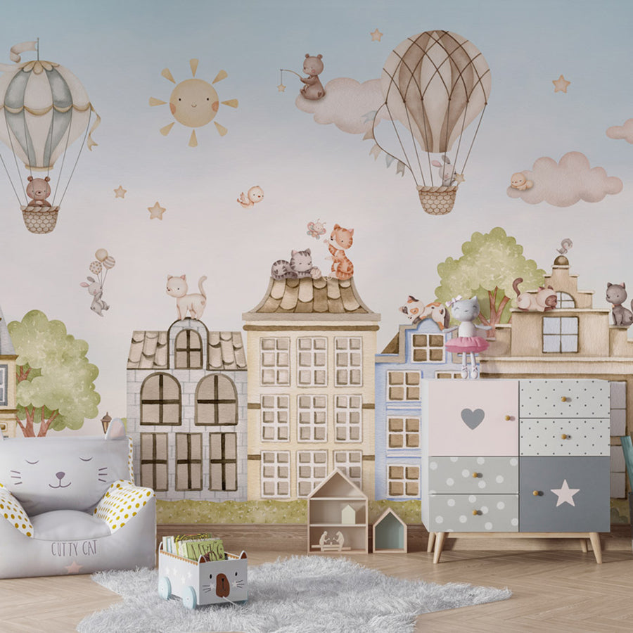 City Cats wallpaper mural shown in a children's bedroom armchair