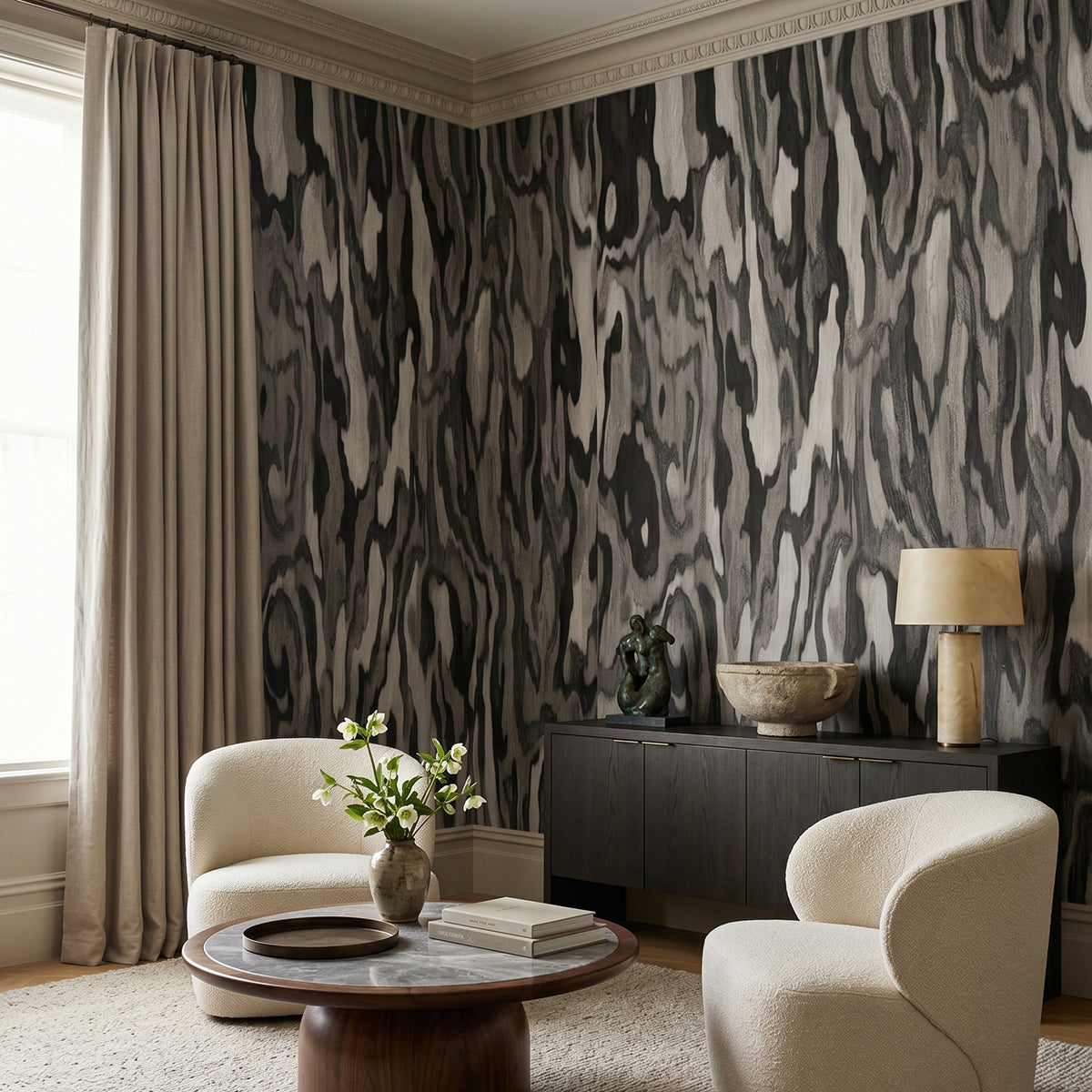 Ettore Root wallpaper mural shown in living room with cream armchairs sideboard