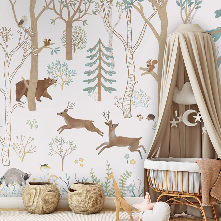 Frisky Forest – Blue wallpaper mural shown in a children's nursery canopy crib