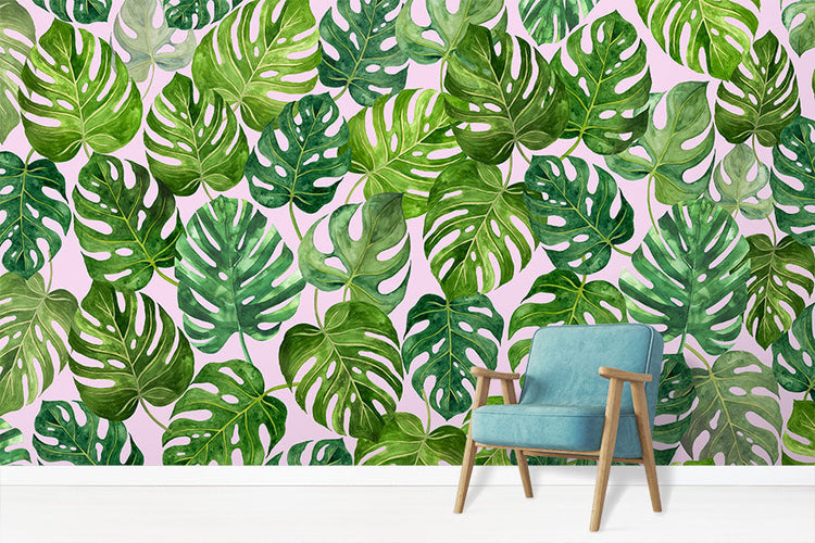 Leaf Wallpaper featuring monstera plant leaves in a room setting with blue chair