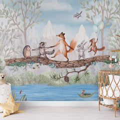 Animal Adventure wallpaper mural shown in a children's nursery crib