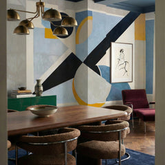 Avant Signal wallpaper mural shown in dining room with table and boucle chairs