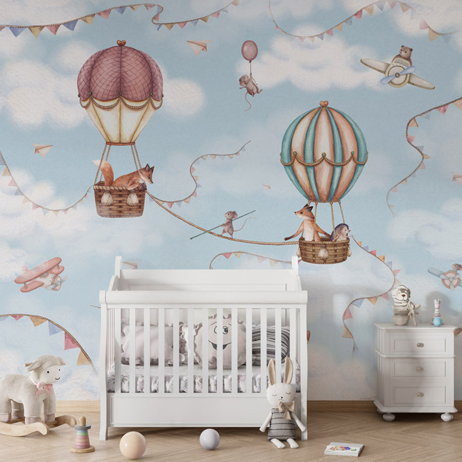 Aviation Adventure wallpaper mural shown in a children's nursery crib
