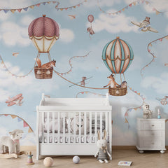 Aviation Adventure wallpaper mural shown in a children's nursery crib