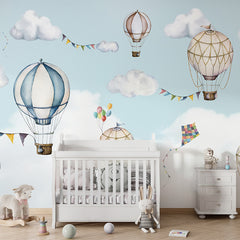 Balloon Bonanza wallpaper mural shown in a children's nursery crib