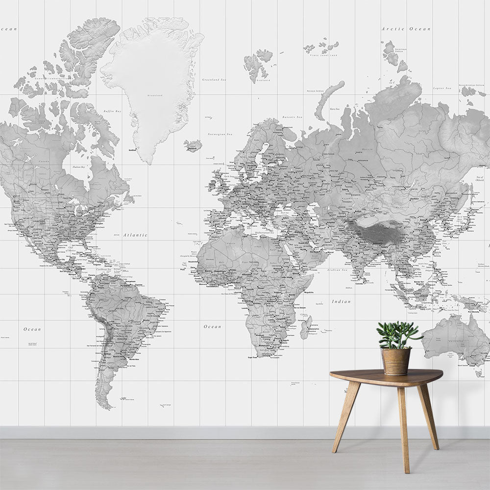 Black and white world map wallpaper mural in a room setting