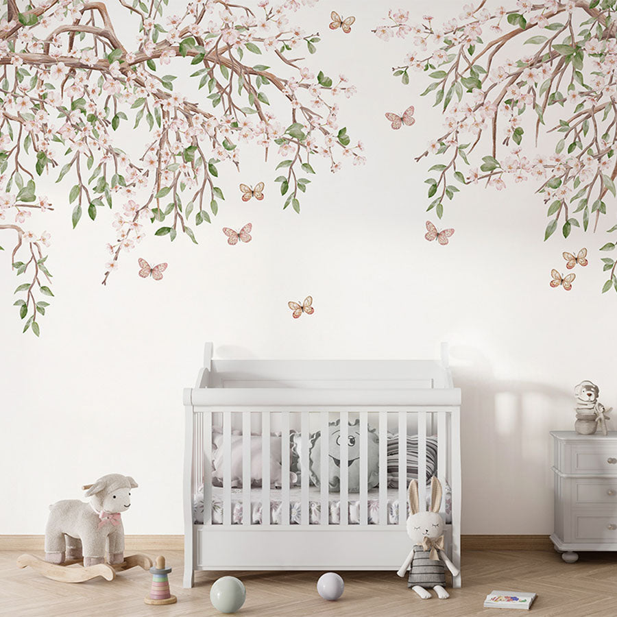Blooming Blossom wallpaper mural in a nursery cot