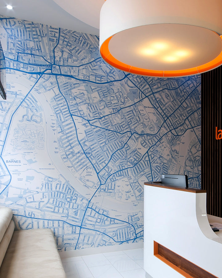 Blue custom OS Street Map wallpaper mural in an office reception