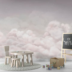 Calming Clouds – Pink wallpaper mural shown in a children's playroom chalkboard