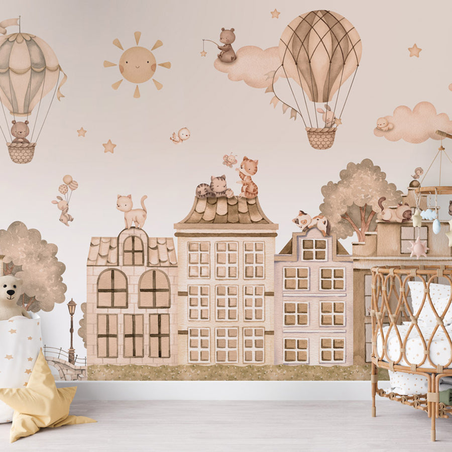 City Cats – Mono wallpaper mural shown in a children's nursery crib