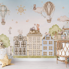 City Cats wallpaper mural shown in a children's nursery crib