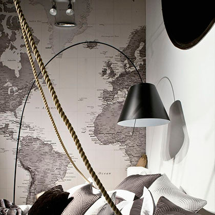 Customer photo of a black and white wallpaper mural with bed and light