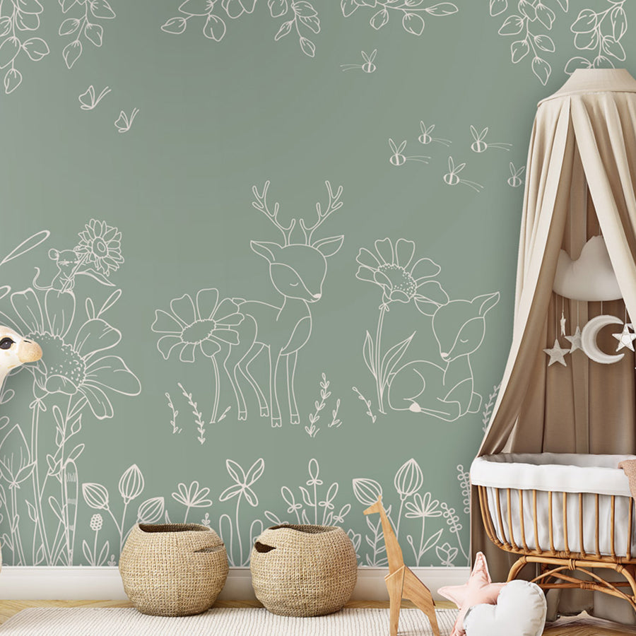 Deer Doodles – Green wallpaper mural shown in a children's nursery canopy crib