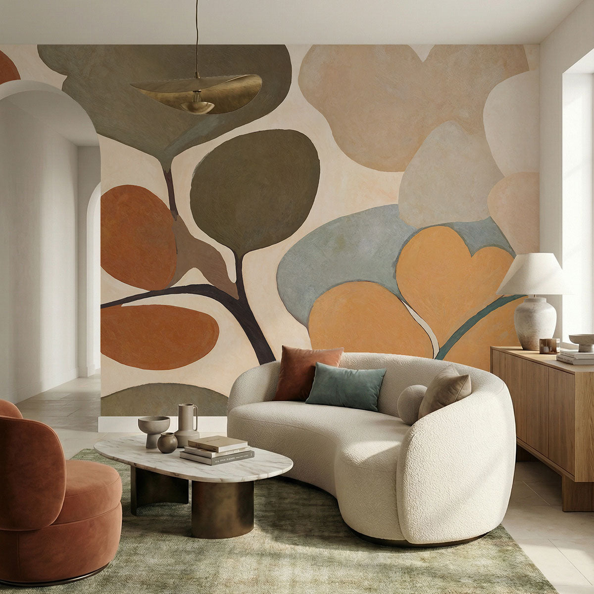 Emil's Bouquet wallpaper mural shown in living room with curved white sofa and rust chair