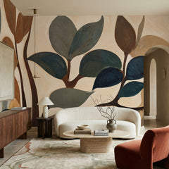 Emil's Garden wallpaper mural shown in living room with white sofa and rust chair