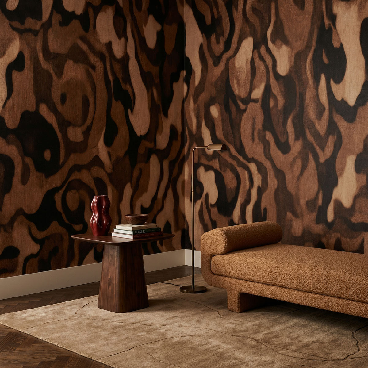 Ettore Grain wallpaper mural shown in living room with tan sofa and round table