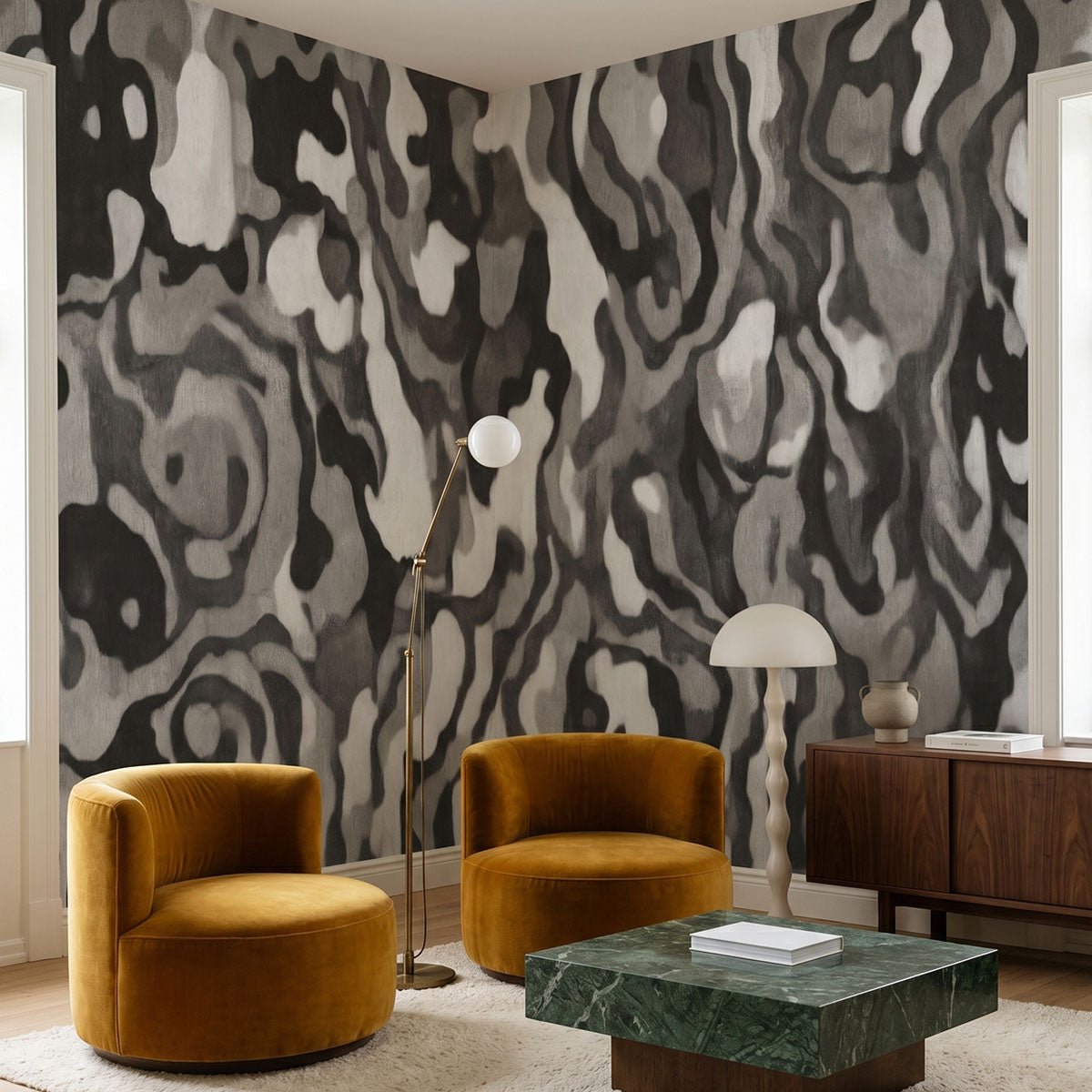 Ettore Line wallpaper mural shown in living room with two mustard armchairs