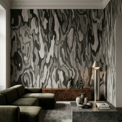 Ettore Root wallpaper mural shown in living room with green sectional