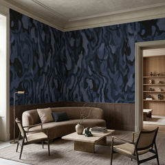 Ettore Veins wallpaper mural shown in living room with beige sofa and black chair