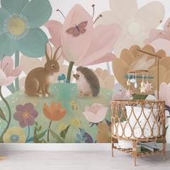Flowery Hill wallpaper mural shown in a children's nursery crib