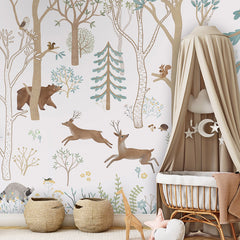 Frisky Forest – Blue wallpaper mural shown in a children's nursery canopy crib