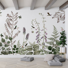 Hummingbird Hedge wallpaper mural in a living room floor cushions