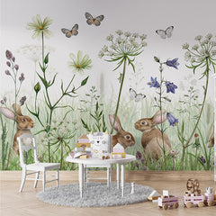 In the Undergrowth wallpaper mural in a children’s playroom table chairs