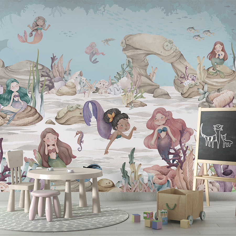 Mermaid Miracles wallpaper mural shown in a children's playroom chalkboard