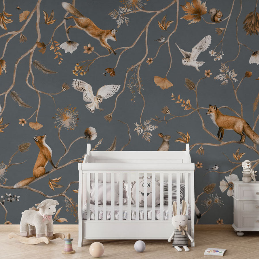 Playful Forest – Blue wallpaper mural in a nursery crib