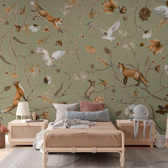 Playful Forest – Green wallpaper mural in a children’s rattan bed