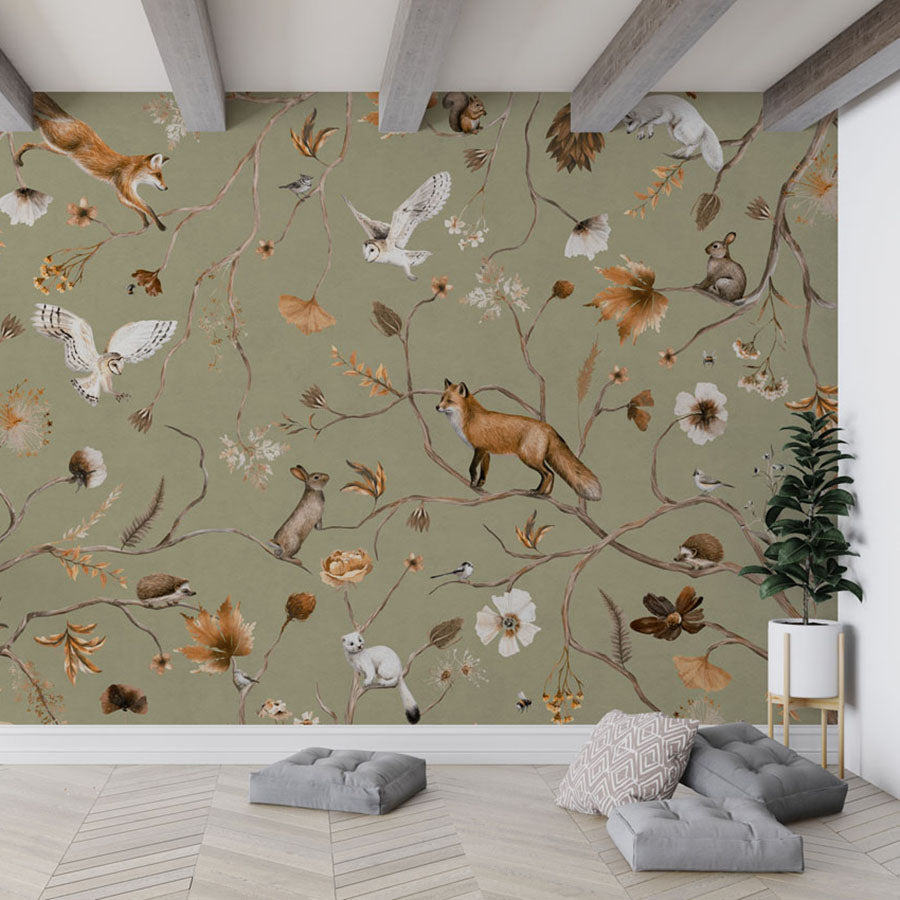Playful Forest – Green wallpaper mural in a living room floor cushions