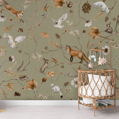 Playful Forest – Green wallpaper mural in a rattan crib