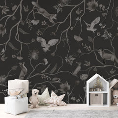 Playful Forest – Monochrome Black wallpaper mural in a children’s playroom storage