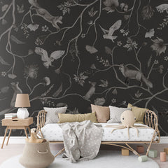 Playful Forest – Monochrome Black wallpaper mural in a rattan daybed