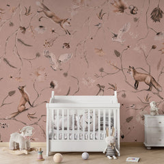 Playful Forest – Monochrome Pink wallpaper mural in a nursery crib
