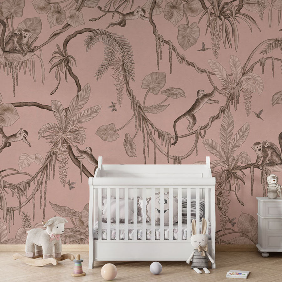 Playful Monkeys – Monochrome Pink wallpaper mural in a nursery crib