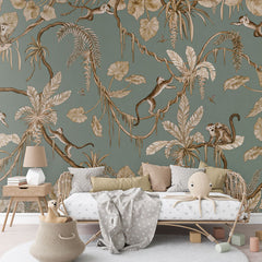 Playful Monkeys – Vintage Green wallpaper mural in a rattan daybed