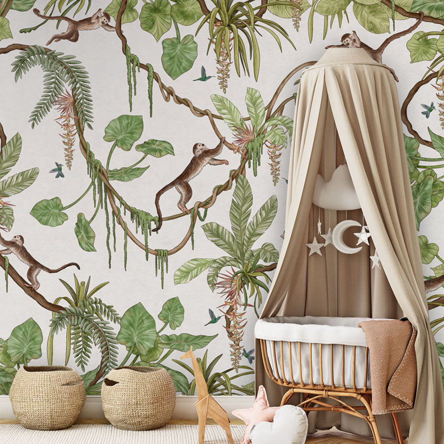 Playful Monkeys – White wallpaper mural in a nursery rattan cot canopy