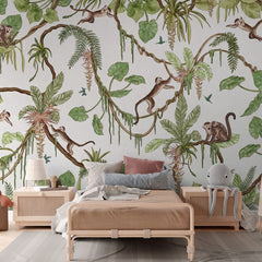 Playful Monkeys – White wallpaper mural in a rattan bed