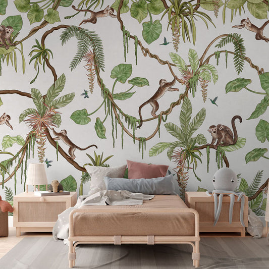 Playful Monkeys – White wallpaper mural in a rattan bed