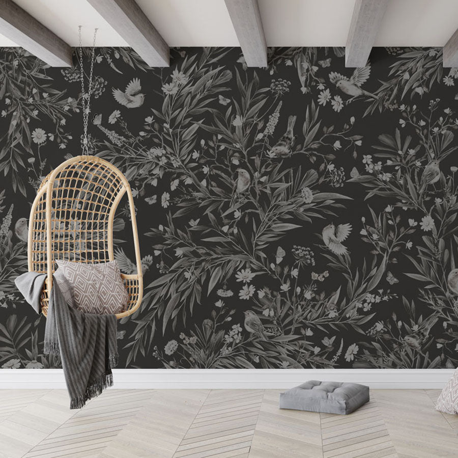 Playful Robins – Monochrome Black wallpaper mural in a hanging chair floor cushions