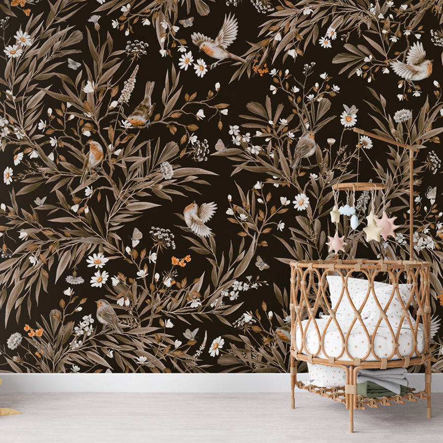 Playful Robins – Vintage Black wallpaper mural in a nursery rattan cot