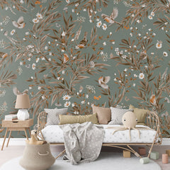 Playful Robins – Vintage Green wallpaper mural in a rattan daybed