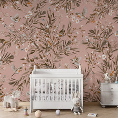 Playful Robins – Vintage Pink wallpaper mural in a nursery crib