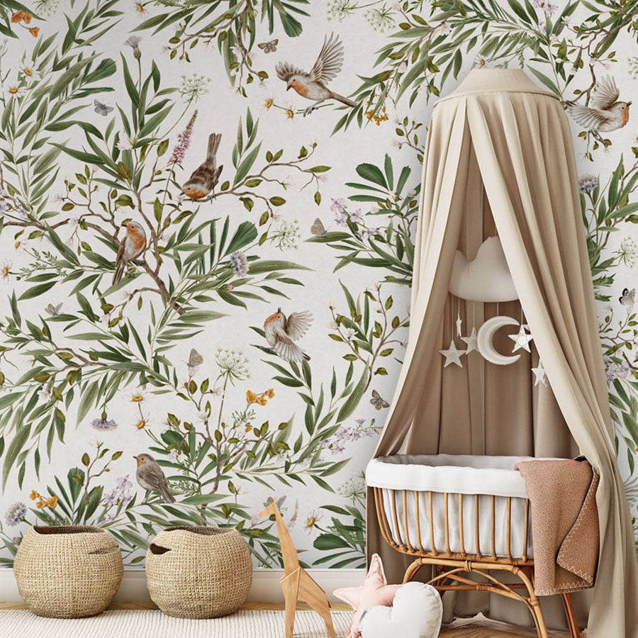 Playful Robins – White wallpaper mural in a nursery rattan cot canopy