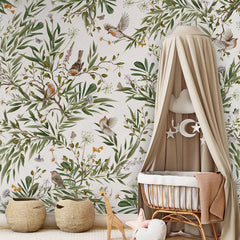 Playful Robins – White wallpaper mural in a nursery rattan cot canopy