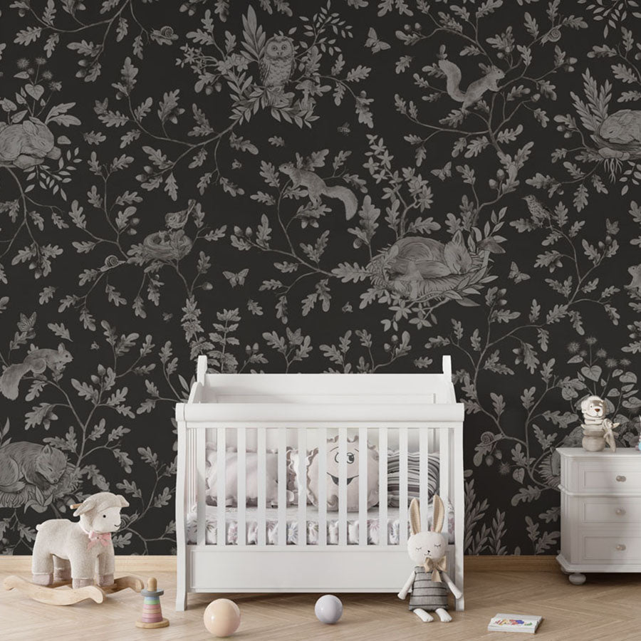 Playful Woods – Monochrome Black wallpaper mural in a nursery crib