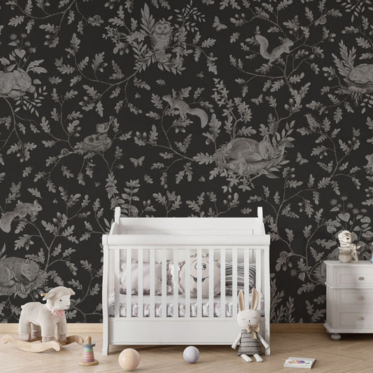 Playful Woods – Monochrome Black wallpaper mural in a nursery crib