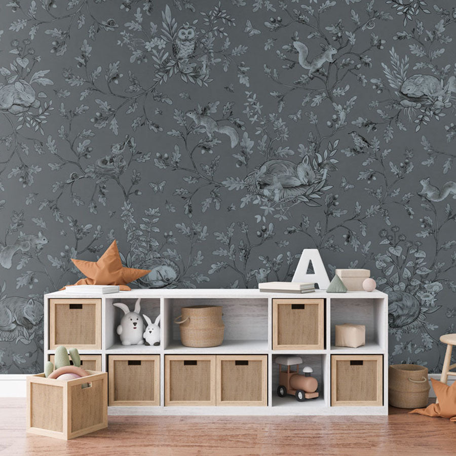 Playful Woods – Monochrome Blue wallpaper mural in a toy storage