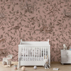Playful Woods – Monochrome Pink wallpaper mural in a nursery crib